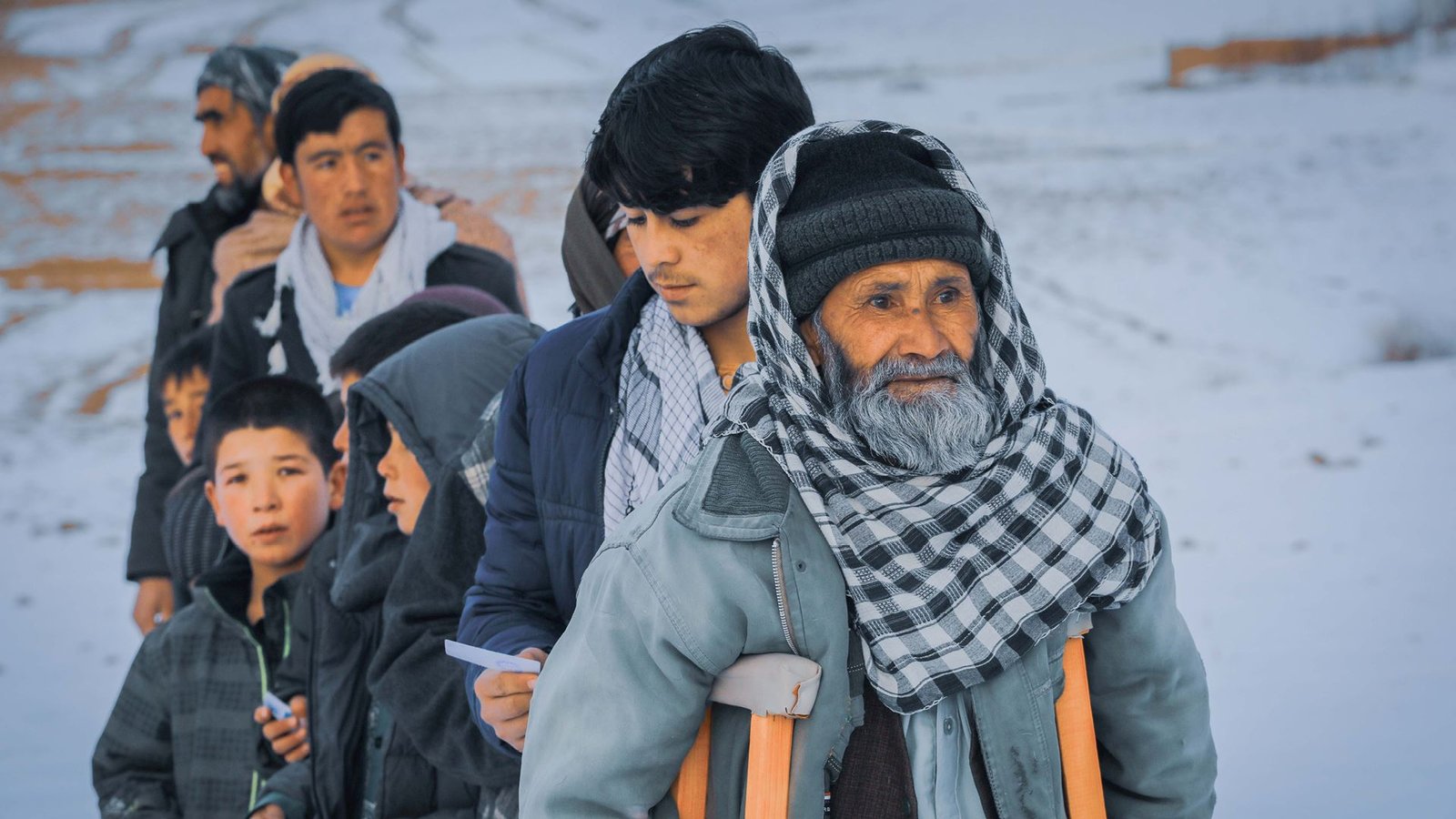 Winter old man queue